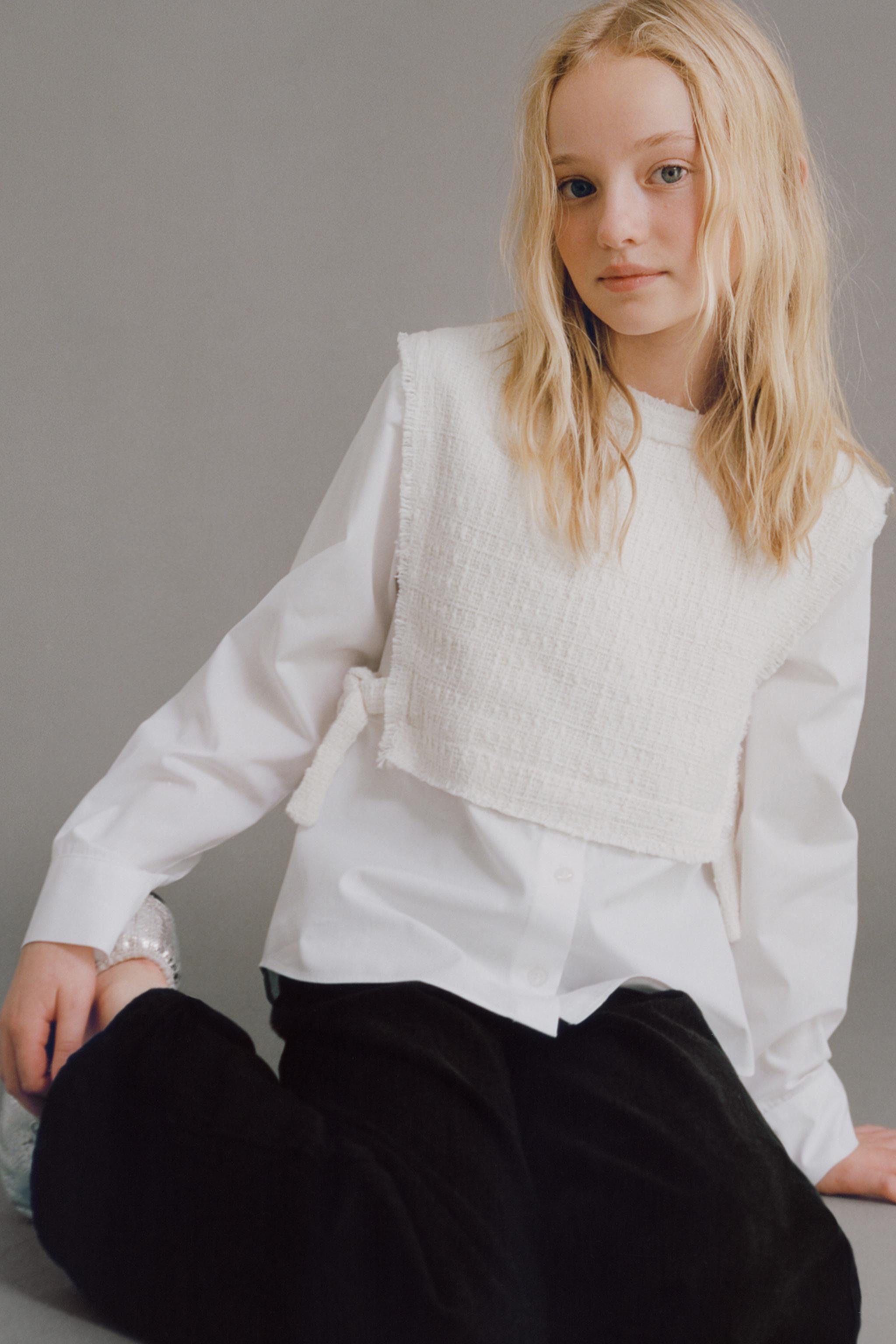 PLAIN SHIRT WITH STRUCTURAL VEST AND BOWS